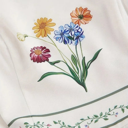 Maxikleid mit Spaghettiträgern, Vintage-Blumenprint, A-Linien-Schnitt und gesmoktem Rücken in Creme